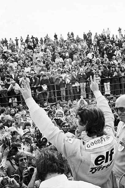F1 fans cheering with flares